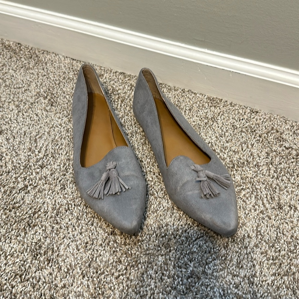 Grey suede tassel flats